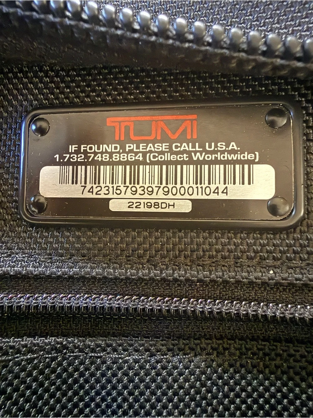 Tumi Black Nylon Messenger Briefcase with Red Accent